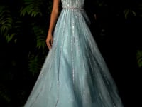 Load and play video in Gallery viewer, Striking embellished tulle overlay A-line floor length formal gown.