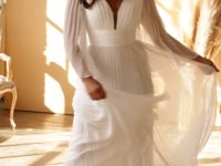 Load and play video in Gallery viewer, ELEGANTLY FLOWING PLEATED CHIFFON GOWN