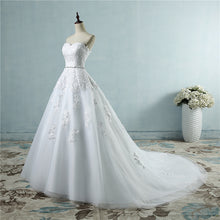 Load image into Gallery viewer, Strapless floral lace appliqued ball gown with embellished waist sweetheart neckline, laced corset back and court length train.