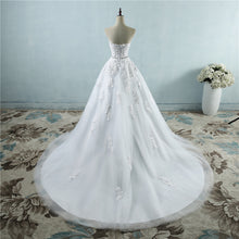 Load image into Gallery viewer, Strapless floral lace appliqued ball gown with embellished waist sweetheart neckline, laced corset back and court length train.