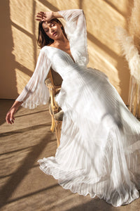 ELEGANTLY FLOWING PLEATED CHIFFON GOWN