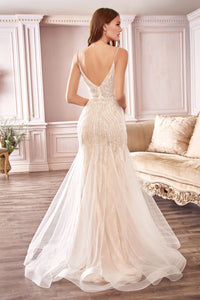 Intricately beaded champagne Chantilly lace mermaid gown.