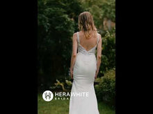 Load and play video in Gallery viewer, HERAWHITE - HW3041 - Beaded Fit And Flare Dress With V Neckline And Crepe Skirt
