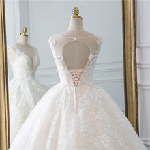 Load image into Gallery viewer, Spectacular natural waist A-line ball gown with a modest illusion sweetheart neckline
