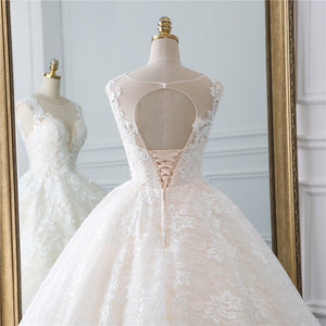 Spectacular natural waist A-line ball gown with a modest illusion sweetheart neckline