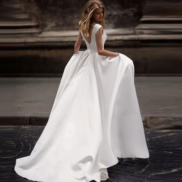 AEDVEG6 Eggshell white satin A-line ball gown with 1/2 capped sleeves and small side pockets